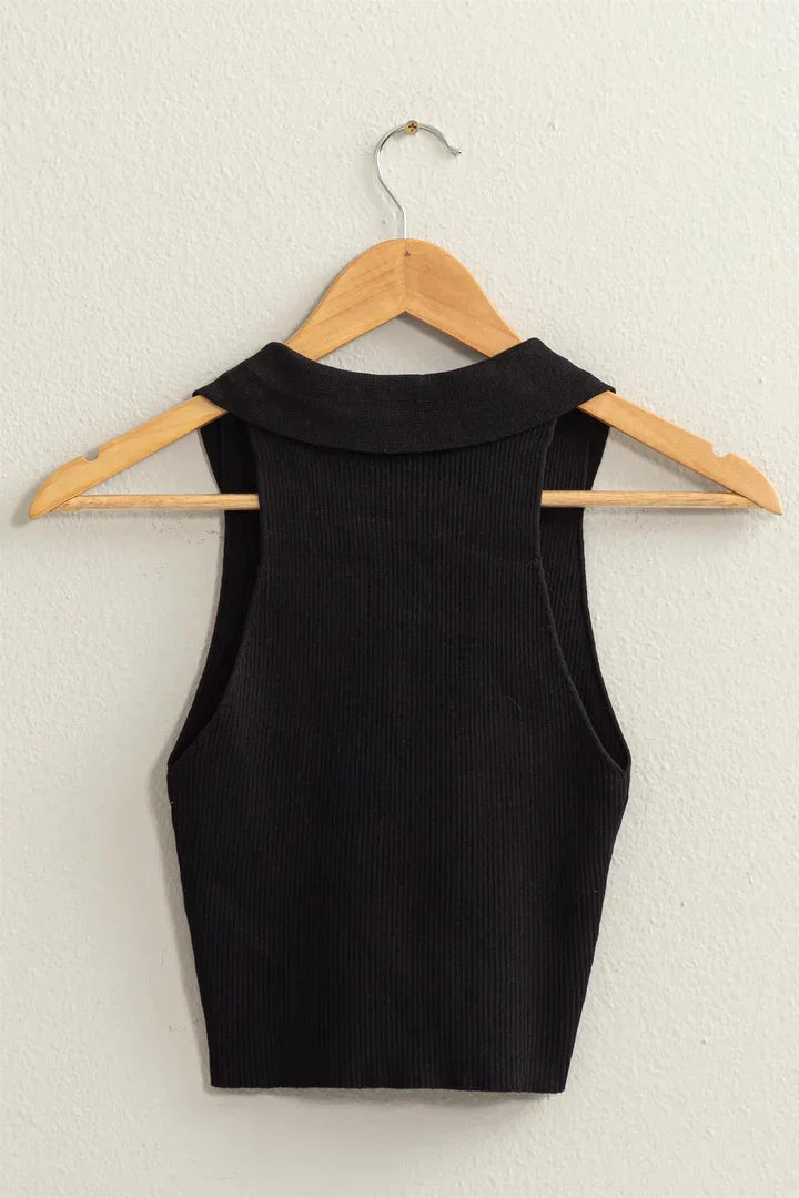 Black sleeveless collared crop knit top with a high neckline and ribbed texture