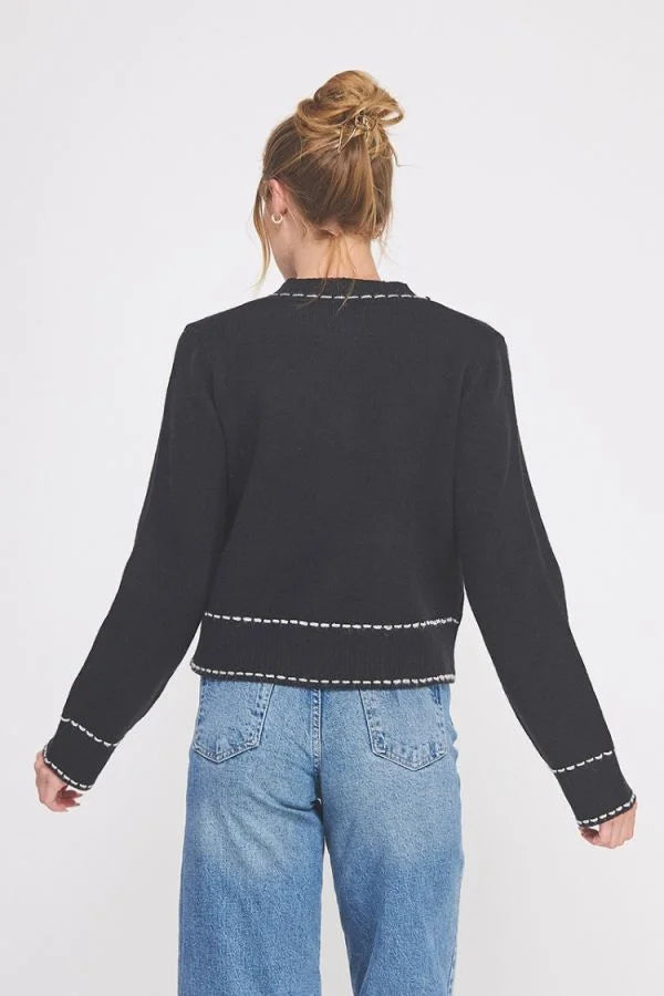 Black long sleeve accent stitch detail cropped cardigan with white trim