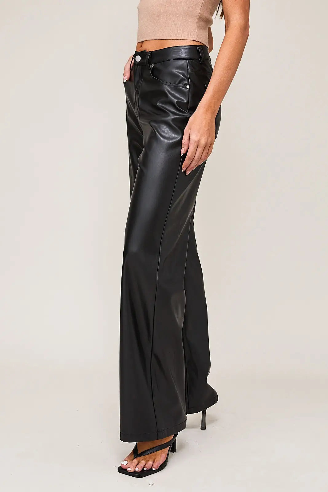 Black high waist faux leather long pants in wide-leg style for a chic look