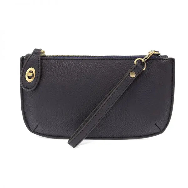Black faux leather wristlet with card slots from Shop Daisy’s women’s boho chic collection