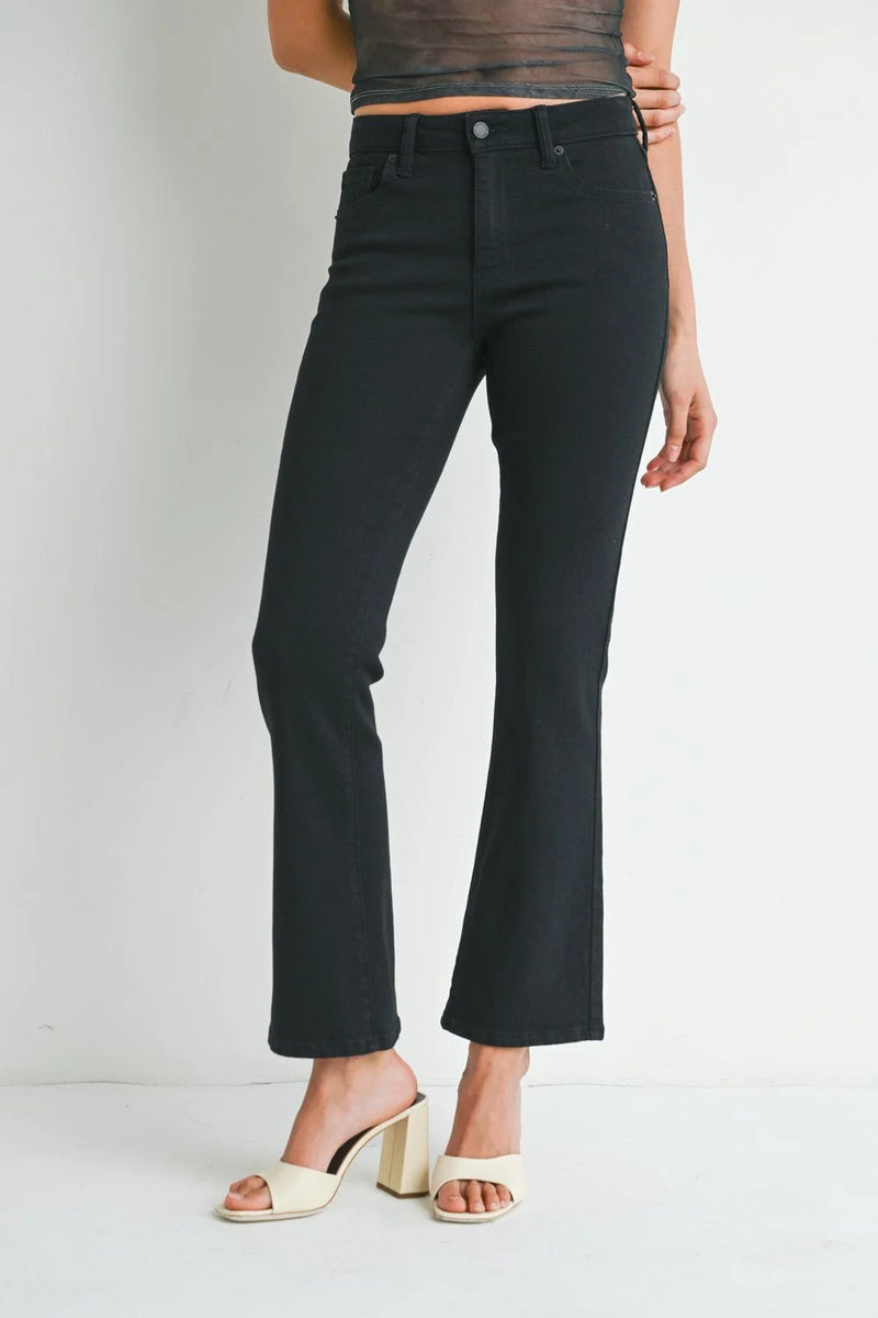 Black flared high waist jeans from Shop Daisy, perfect for women’s boho chic clothing