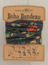 Black and floral boho bandeau headwrap with brown tag, ideal for stylish hairstyles