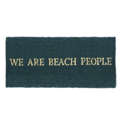 Black and gold Beach People doormat featuring the phrase We Are People