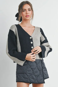 Black and gray quilted mini skirt with color block button detail