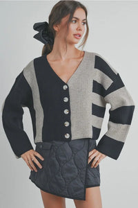 Color block button down cardigan in black and gray stripes with ribbed knit