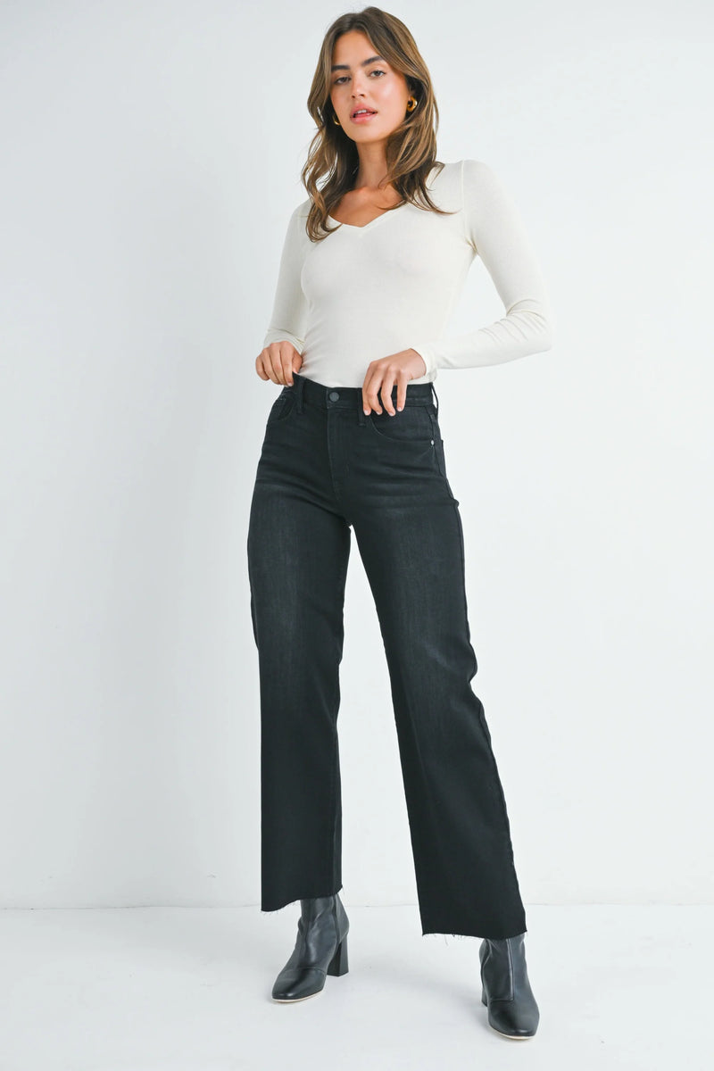 Black slim palazzo denim jeans with high-waisted flare and button fly