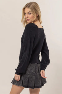 Black knit CRISSCROSS SWEATER with balloon sleeves and denim mini skirt, women’s boho chic clothing