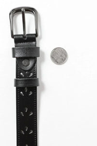 Black leather belt with petal punch cutout patterns and a stylish metal buckle