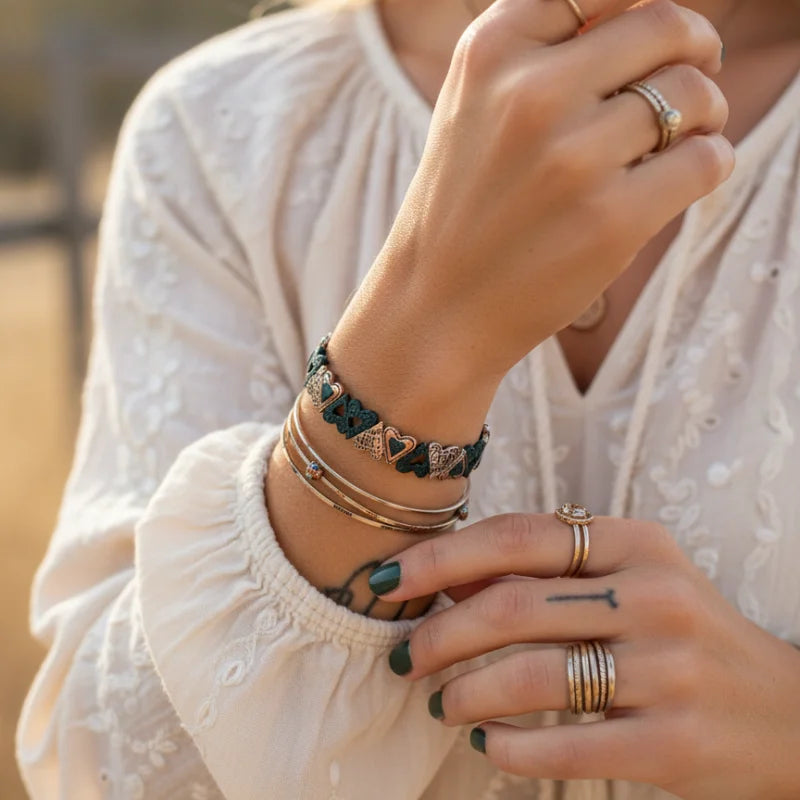 Bohemian live love laugh bracelet in black leather with silver triangle beads