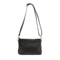 Black vegan leather crossbody bag with decorative stitching, removable shoulder strap, and wristlet strap for versatile style