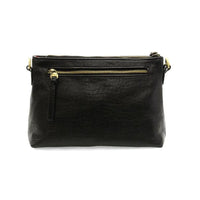 Black vegan leather crossbody bag with gold-tone hardware and removable shoulder strap