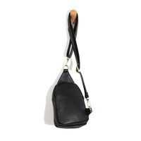 Black leather crossbody bag with single strap, perfect for the Skyler Sling Bag