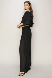 Black linen off shoulder top in a stylish palazzo pants set for a flowy silhouette