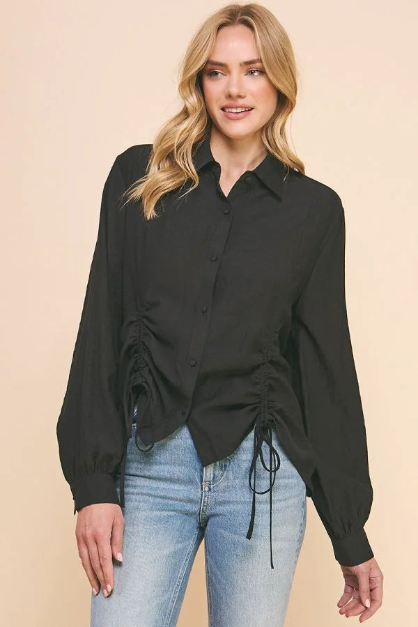 Black long-sleeved woven button blouse with princess seam and ruched drawstring detail