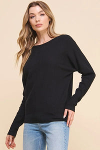 Black long-sleeved Soft Chevron Pattern Pullover Sweater worn by a blonde woman