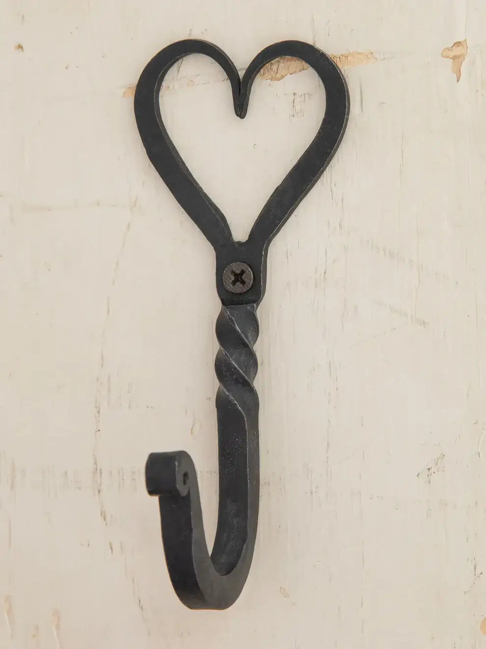 Black metal heart-shaped wall hook from the IRON WALL HOOK collection