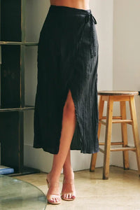 Black midi skirt with side slit and textured fabric for women’s boho chic clothing