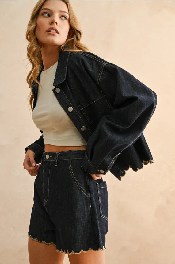 Black scallop embroidery shorts with button closure and pockets