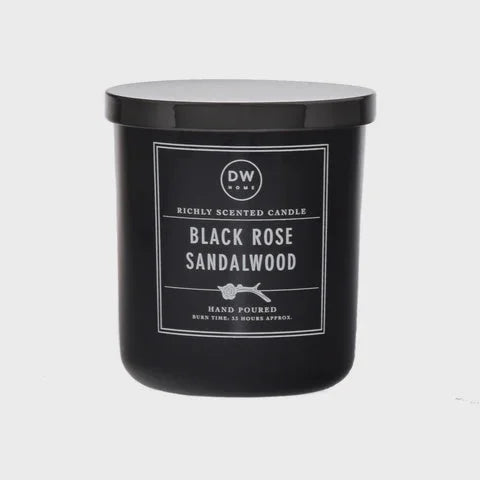 Black scented candle in glass jar labeled Black Rose Sandalwood, ideal for womens boho clothes