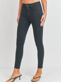 Black high-rise skinny jeans with ankle-length cut from Shop Daisy for women’s boho chic clothing