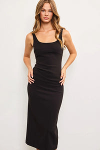 Black fitted sleeveless long dress with square neckline and back slit detail