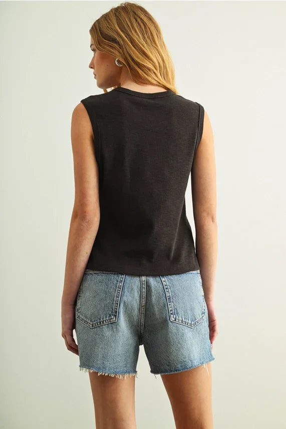 Black sleeveless cotton round neck top with relaxed fit and subtle texture