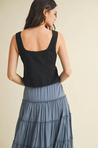 Black scallop trim edge tie front sleeveless top with ruffles