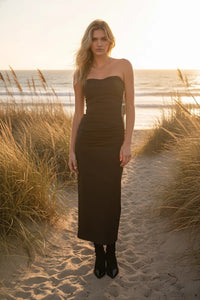 Lavene Strapless Maxi Dress featuring a black strapless midi design with ruched details
