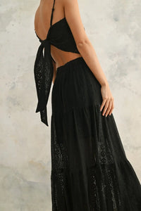 Black two-piece dress with tie back made of crochet lace fabric and a fabric tube handkerchief style