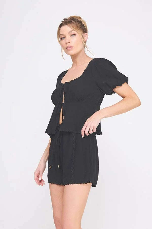 Black linen blend puff short set featuring puff short sleeve and lace-up top