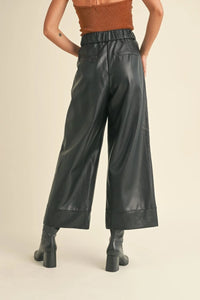 Black vegan wide straight leg leather pants with high waist and pockets