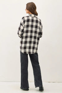 Soft Buffalo Check Flannel Shirt styled over dark pants for a trendy look