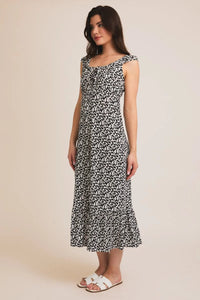 Black and white floral print midi dress with tie cap sleeves and a sweetheart neckline