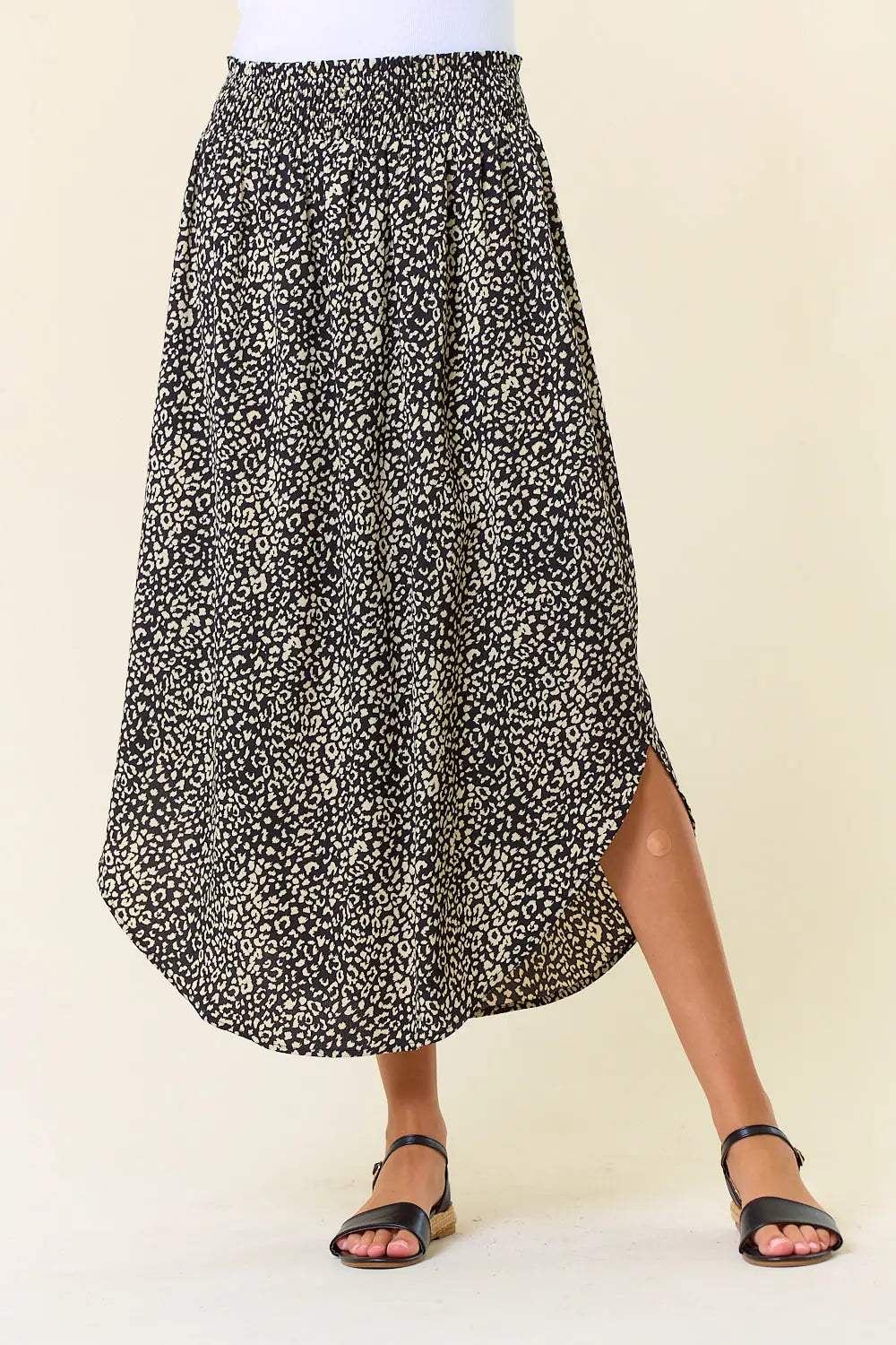 Black and white leopard print midi skirt with curved hem slits for women’s boho chic clothing