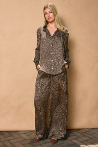 Black and white patterned long-sleeve shirt with matching relaxed fit sand pull drawstring pants