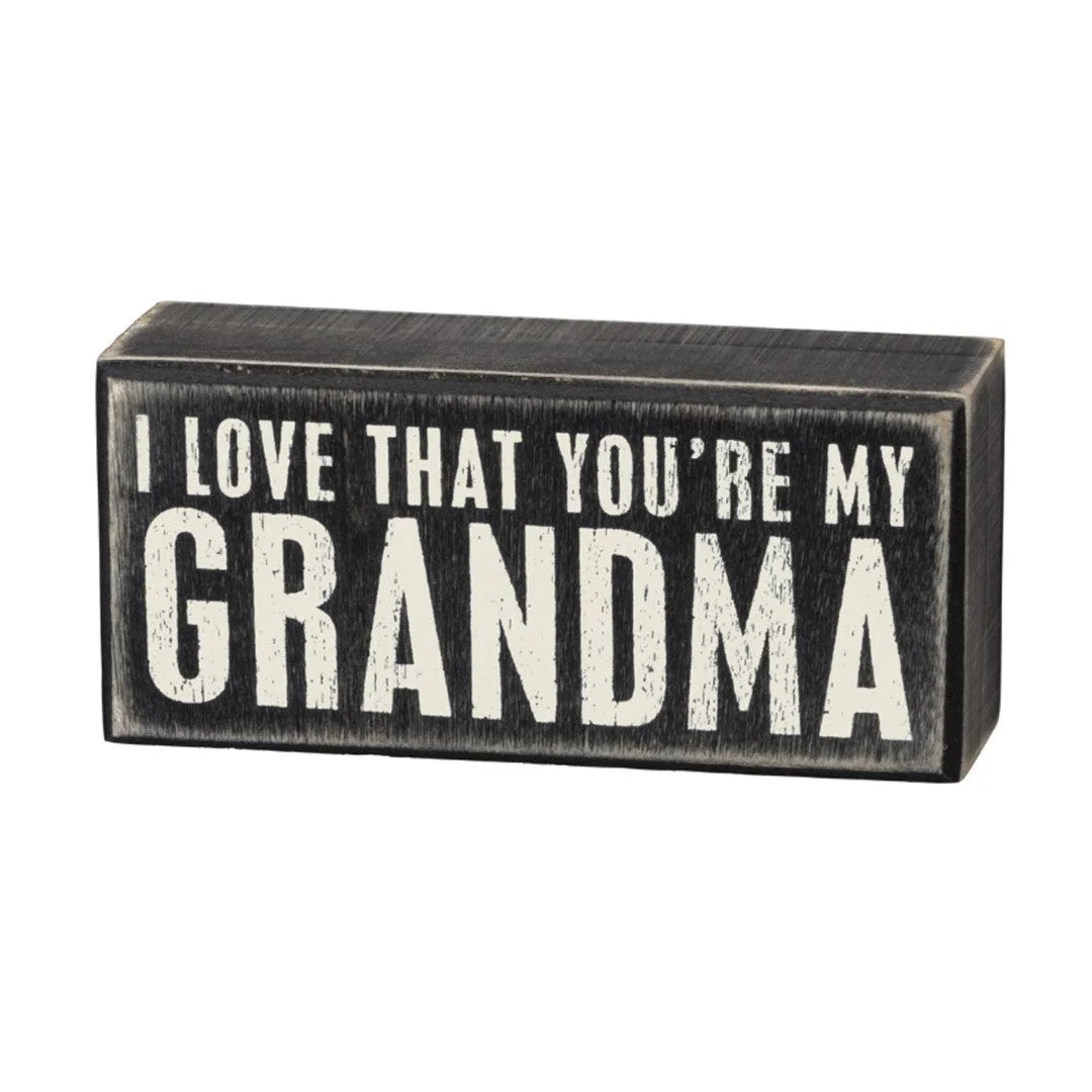 Black and white grandma box sign displaying heartfelt message about love for Grandma