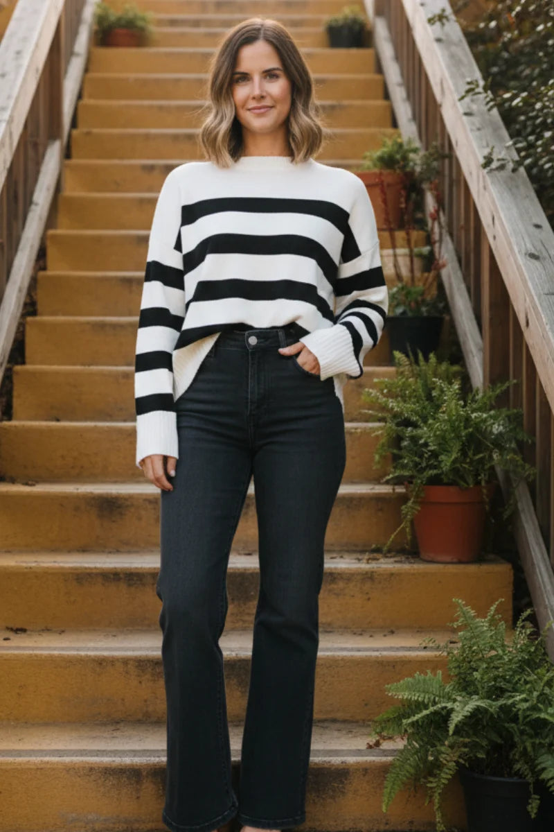 Black and white striped crew neck sweater with long sleeves
