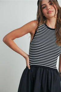 Black and white striped sleeveless maxi dress with flared skirt