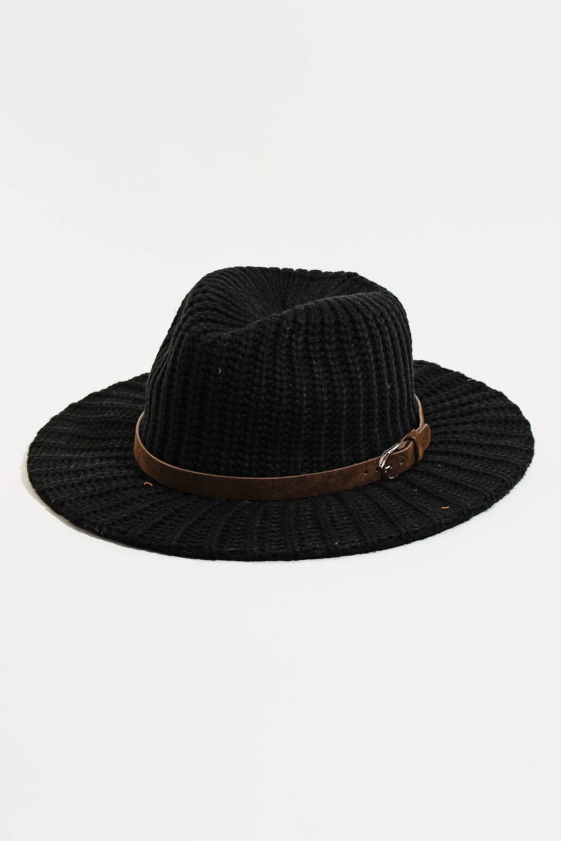 Black wide-brimmed Ribbed Knit Strap Panama Hat with brown leather band for a boho style