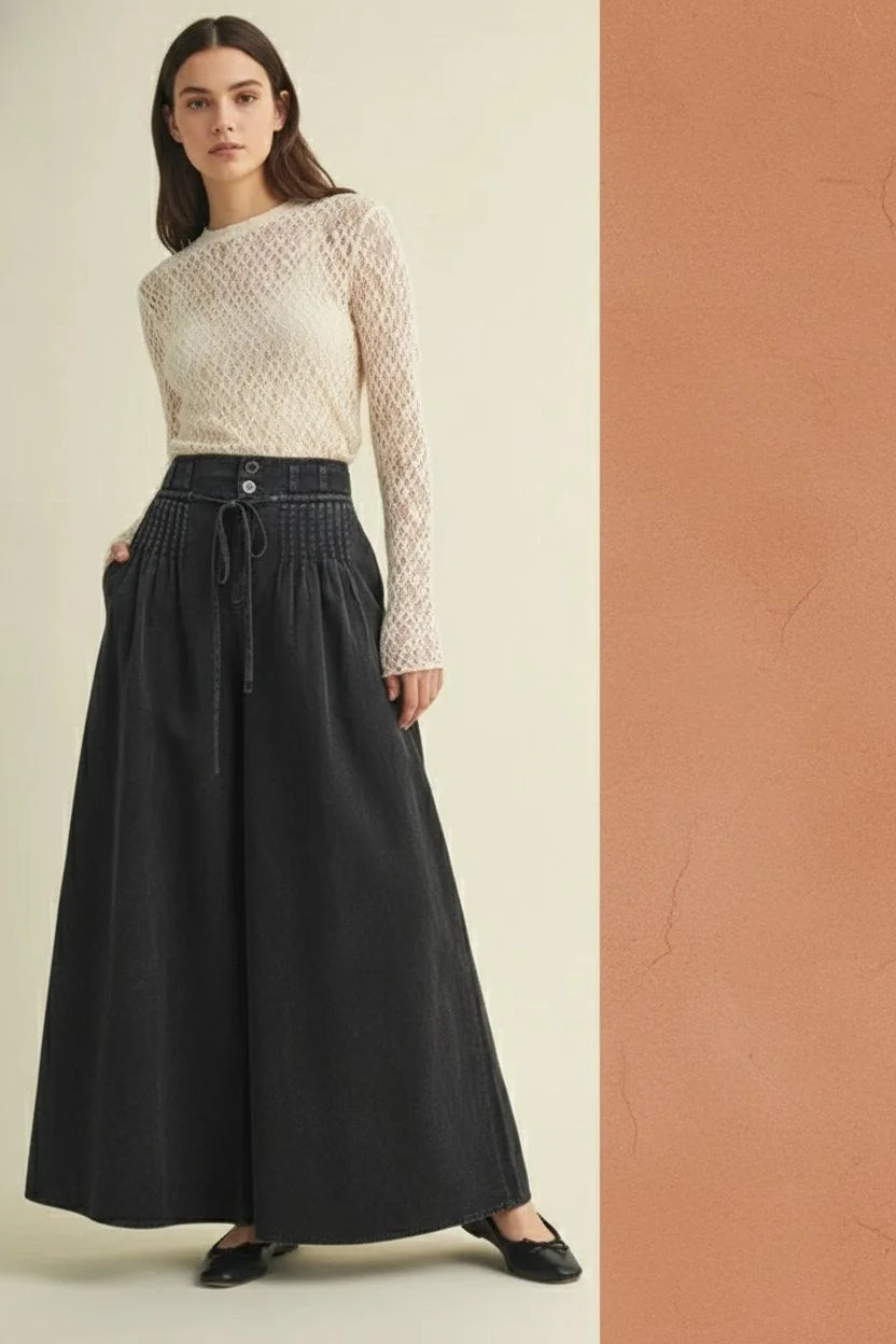 Black pintuck wide leg pants with drawstring waist and button detail