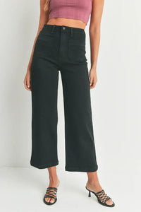Black wide-leg pants from THE SAILOR POCKET featuring high-rise waist and patch pockets