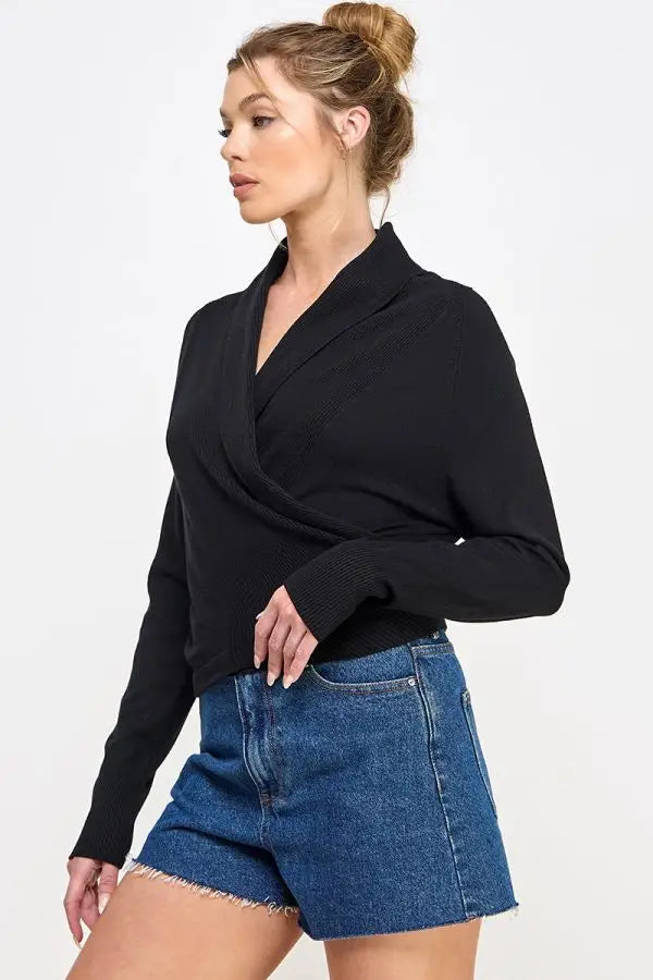 Black wrap-style blazer with long sleeves showcasing soft mixed texture design