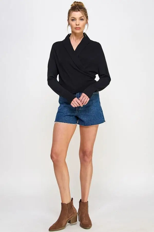 Black soft mixed texture wrap sweater with shawl collar, styled with denim shorts and ankle boots