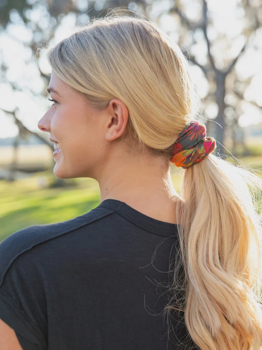 Blond woman with ponytail wearing Full Boho Bandeau Headband in a park setting