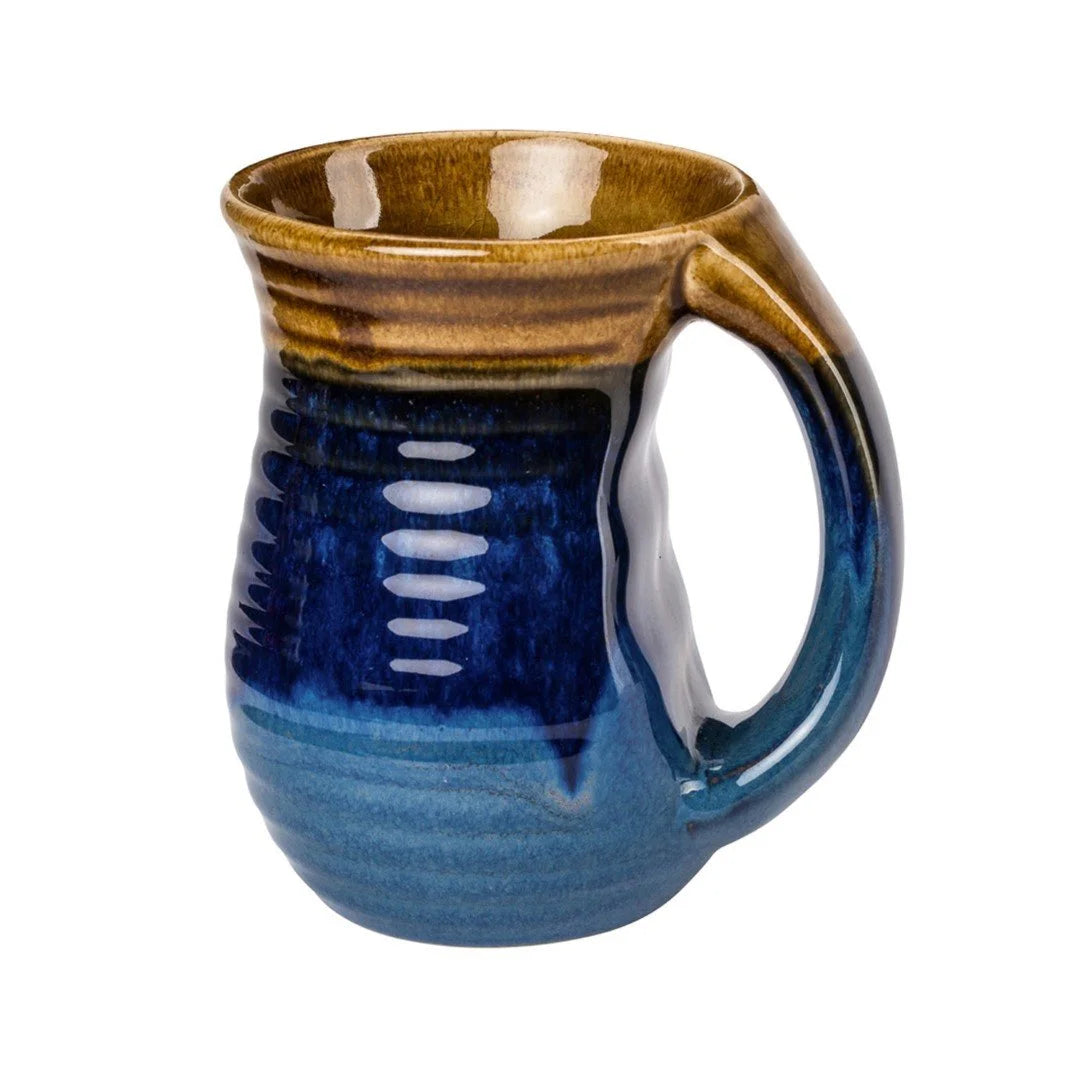 Blue cozy ceramic mug featuring a stylish blue and brown design with a sturdy handle