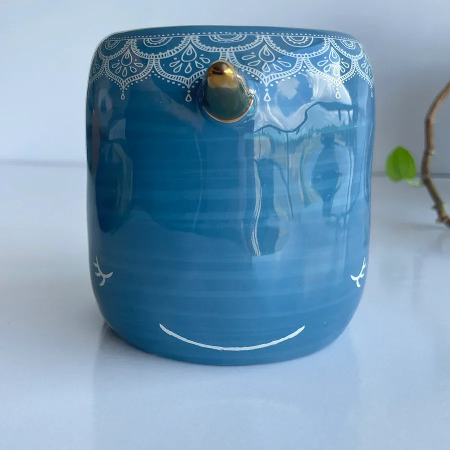 Blue ceramic NARWHAL FOLK ART MUG with decorative patterns and gold accent