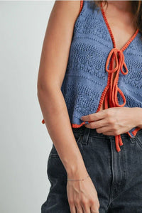 Blue crochet tie front vest with orange trim, ideal for women’s boho chic clothing from Shop Daisy
