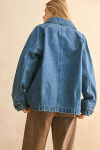 Blue denim casual jacket paired with brown pants, perfect for a denim casual look