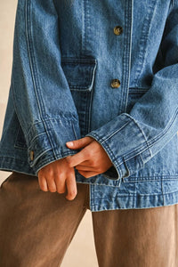 Denim casual jacket with brown buttons paired with brown pants, perfect for casual wear