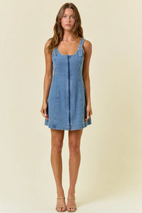 Blue denim dress with double scoop neck and front zip, adjustable buckle straps